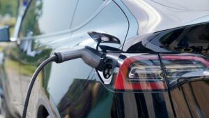 an electric car being charged by a charger